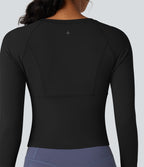 Top de sport yoga polaire col rond manches longues avec trous pouces