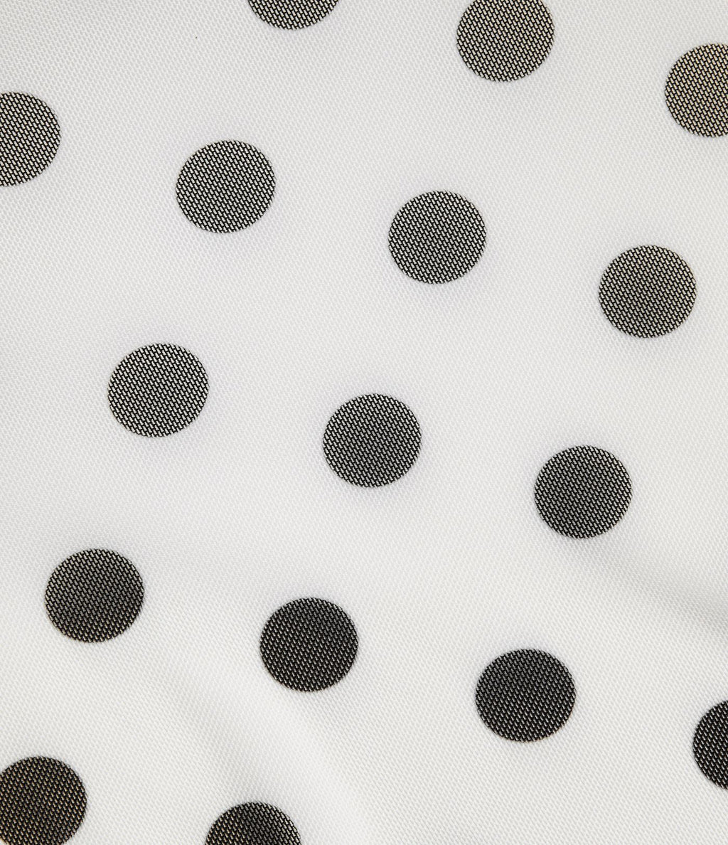 Jupe évasée micro-mini en maille à pois, taille haute, à nouer sur le côté et poche