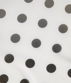 Jupe évasée micro-mini en maille à pois, taille haute, à nouer sur le côté et poche