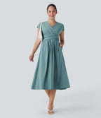 Robe midi Breezeful™ col V manches courtes à liens dans le dos séchage rapide avec poches latérales