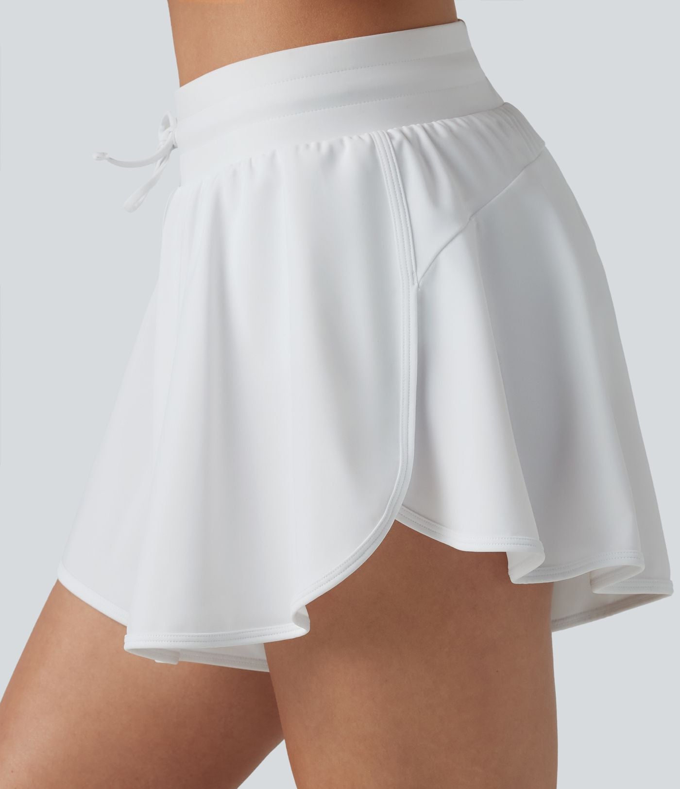 Short de bain 2 en 1 taille mi-haute ourlet arrondi fendu avec cordon de serrage et poches