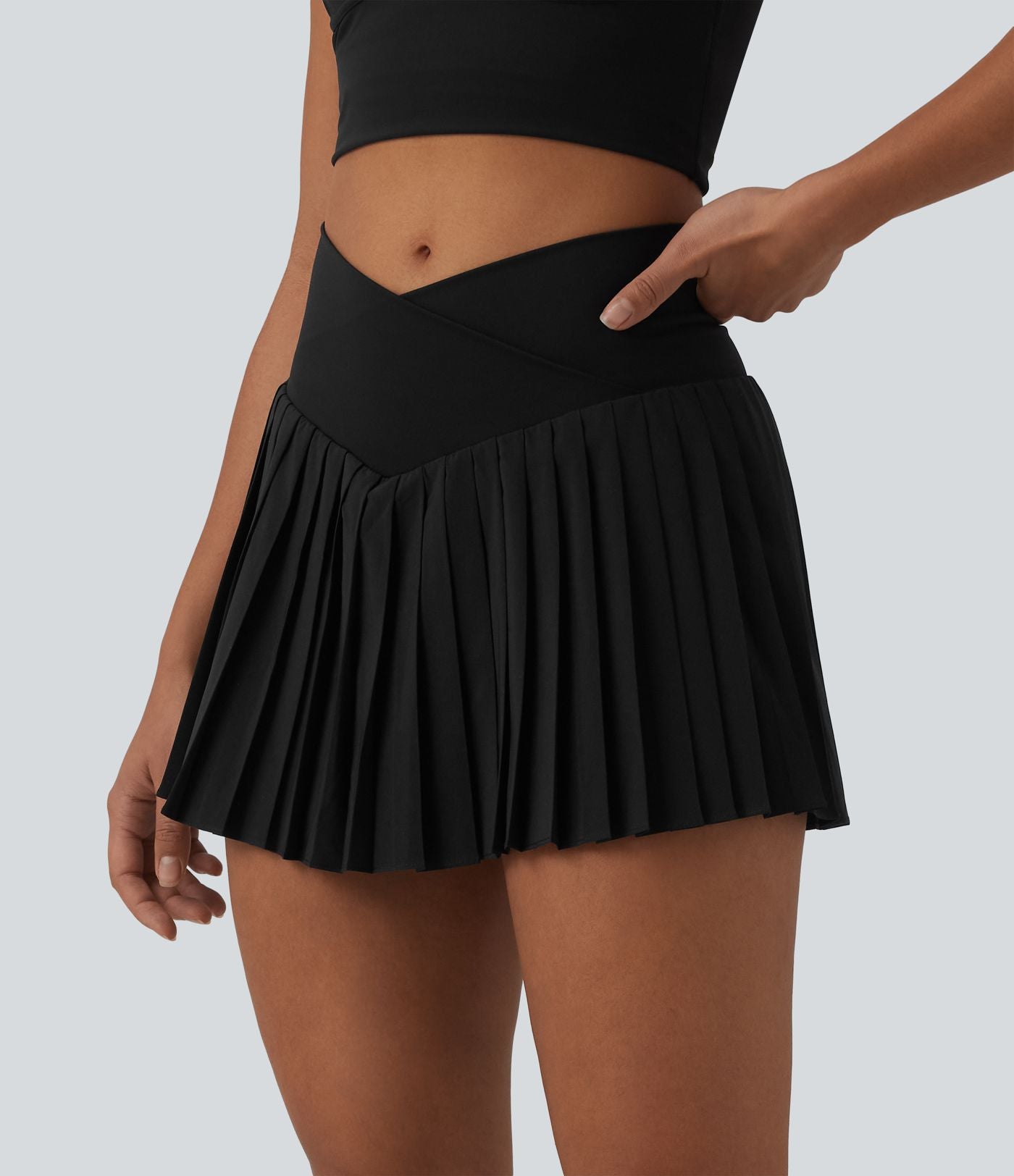 Breezeful™ Jupe-short tennis mini 2-en-1 plissée séchage rapide taille haute croisée avec poches