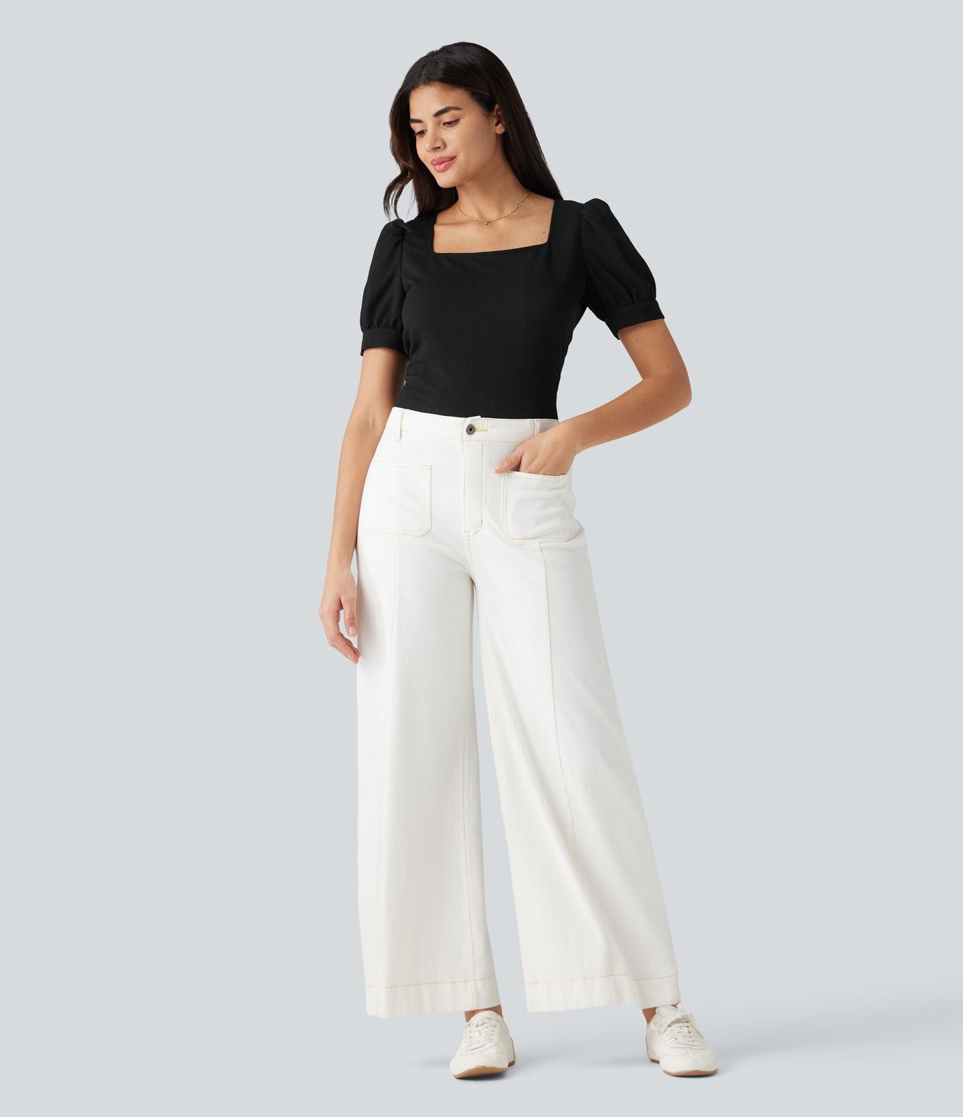 Blouse habillée col carré à manches bouffantes et tissu texturé