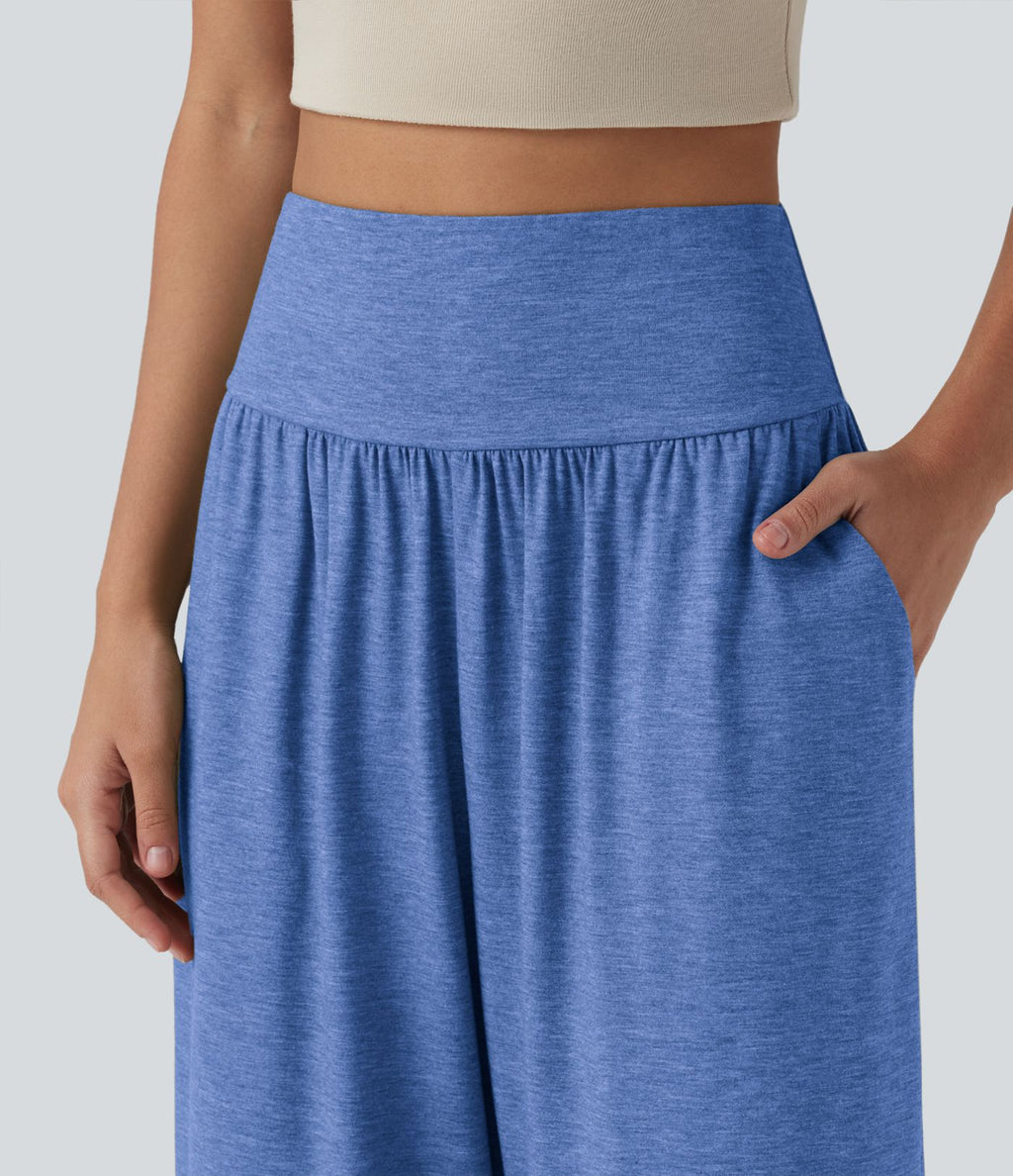 Pantalon décontracté taille haute gainant avec ourlet arrondi et poches