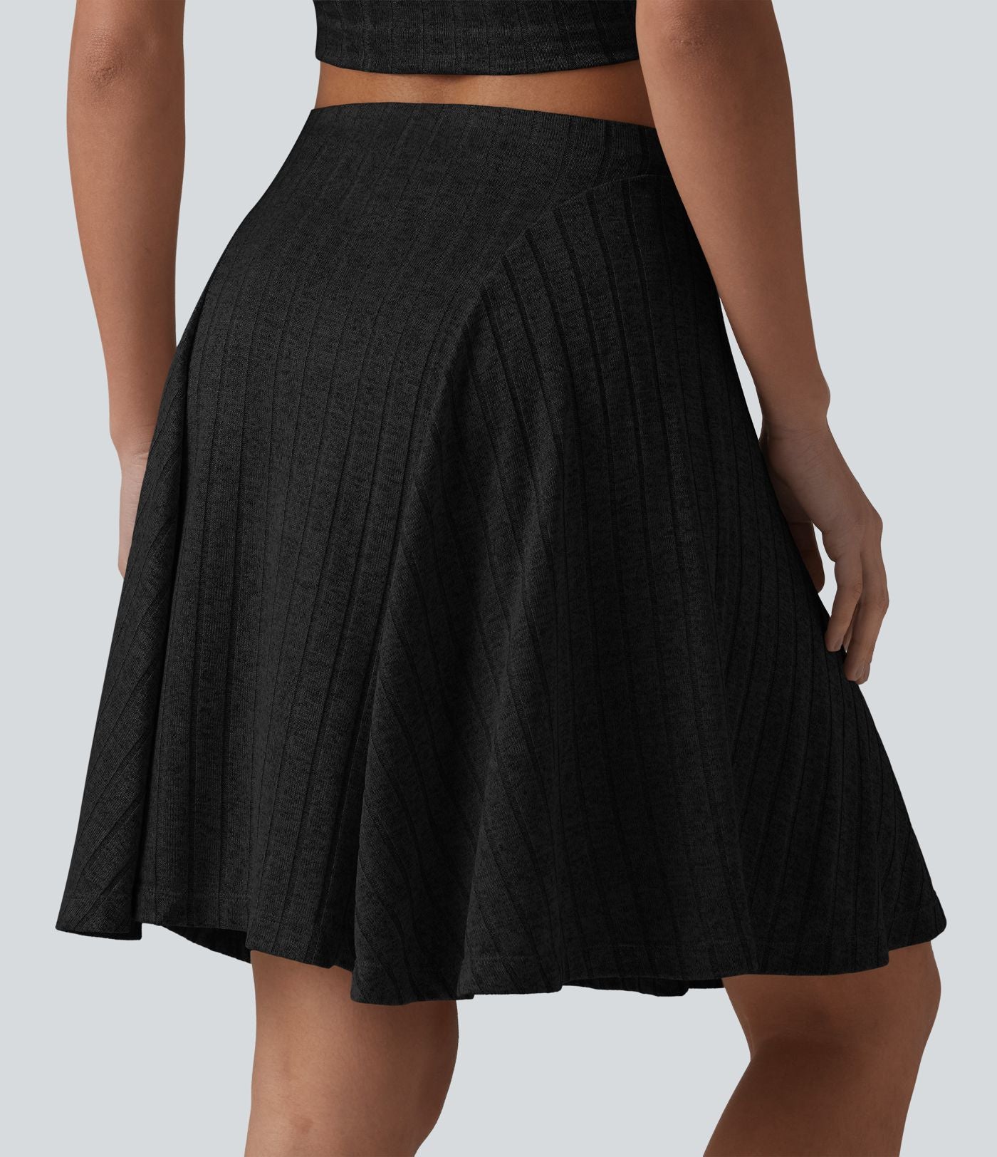 Jupe mini évasée casual 2 en 1 en maille côtelée taille haute avec poches