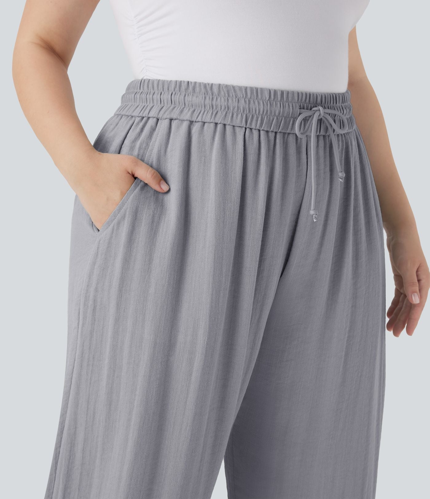 Pantalon décontracté grande taille large fluide taille haute effet lin avec cordon de serrage et poches