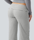 Pantalon évasé rayé taille basse à rabat
