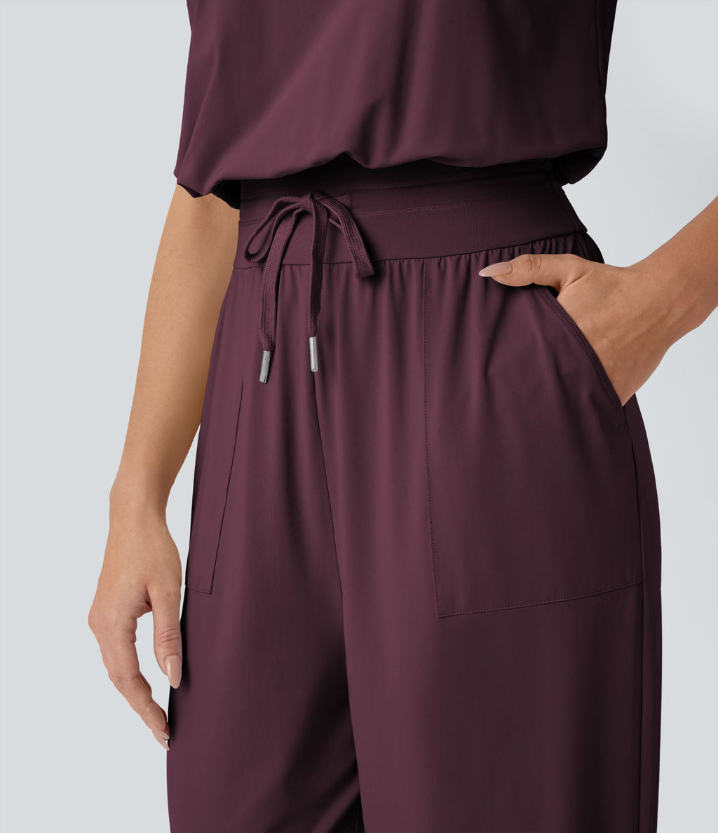 Combinaison de yoga col bateau sans manches dos nu avec découpes et poches latérales à cordon de serrage effet frais InstantCool, protection solaire UPF50+