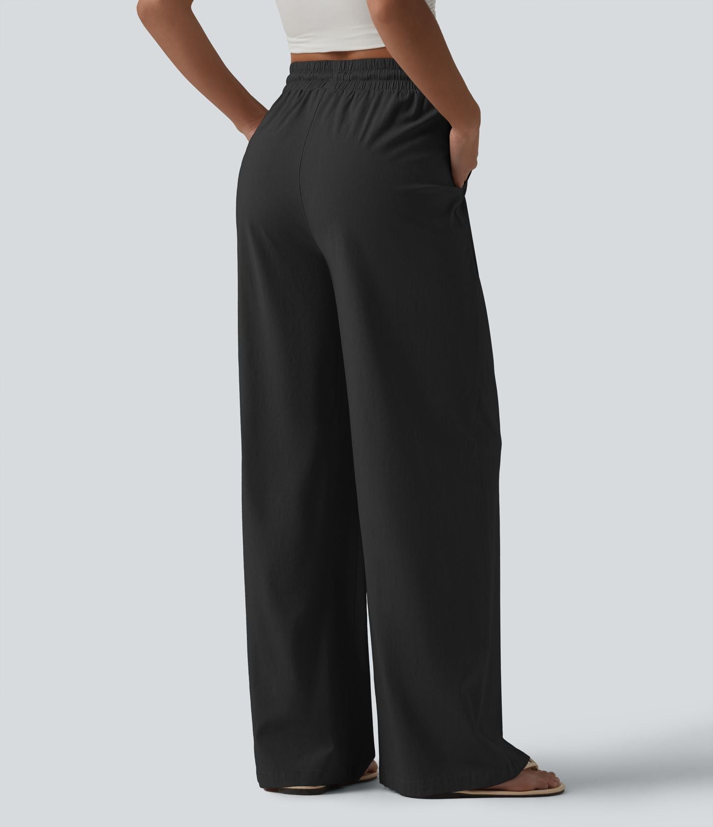 Pantalon large fluide en lin stretch taille haute avec cordon de serrage et poches