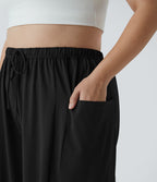 Pantalon Large Casual Taille Mi-Haute Taille Élastique Cordon Poches Latérales Ourlet Flottant Grande Taille