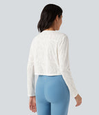 Top de sport yoga jacquard ourlet croisé col rond manches longues