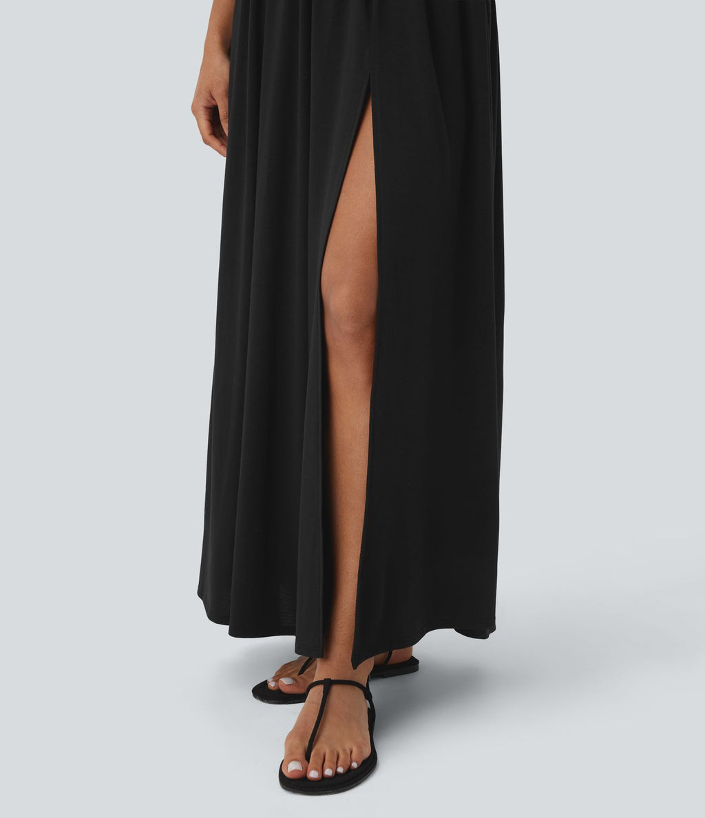 Robe longue fluide fendue avec poches latérales, dos nu et effet torsadé
