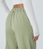 Pantalon décontracté droit taille moyenne à bouton, fermeture éclair et poches latérales