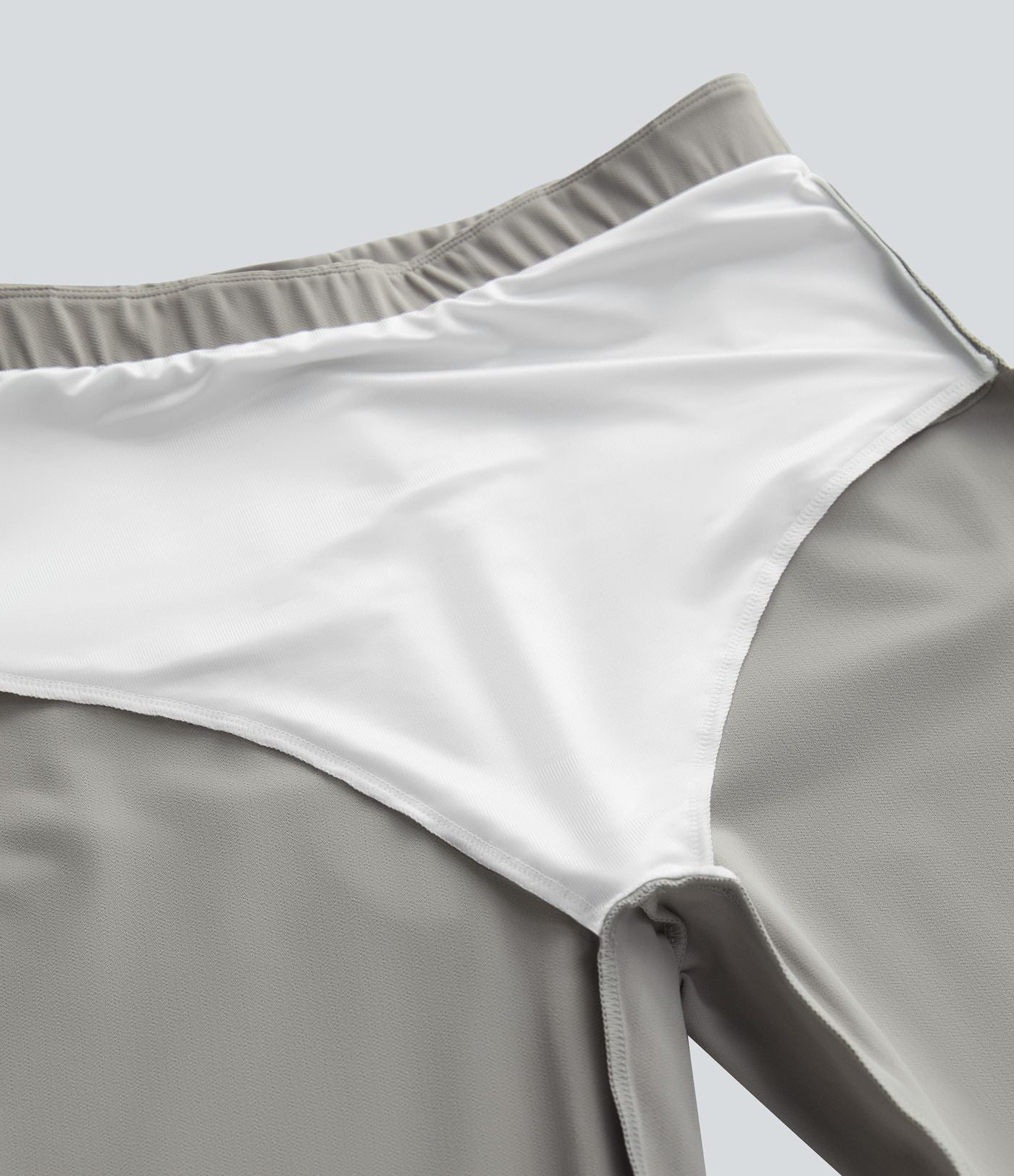 Pantalon tailleur skinny gainant taille haute à chevrons avec poches arrière zippées décoratives
