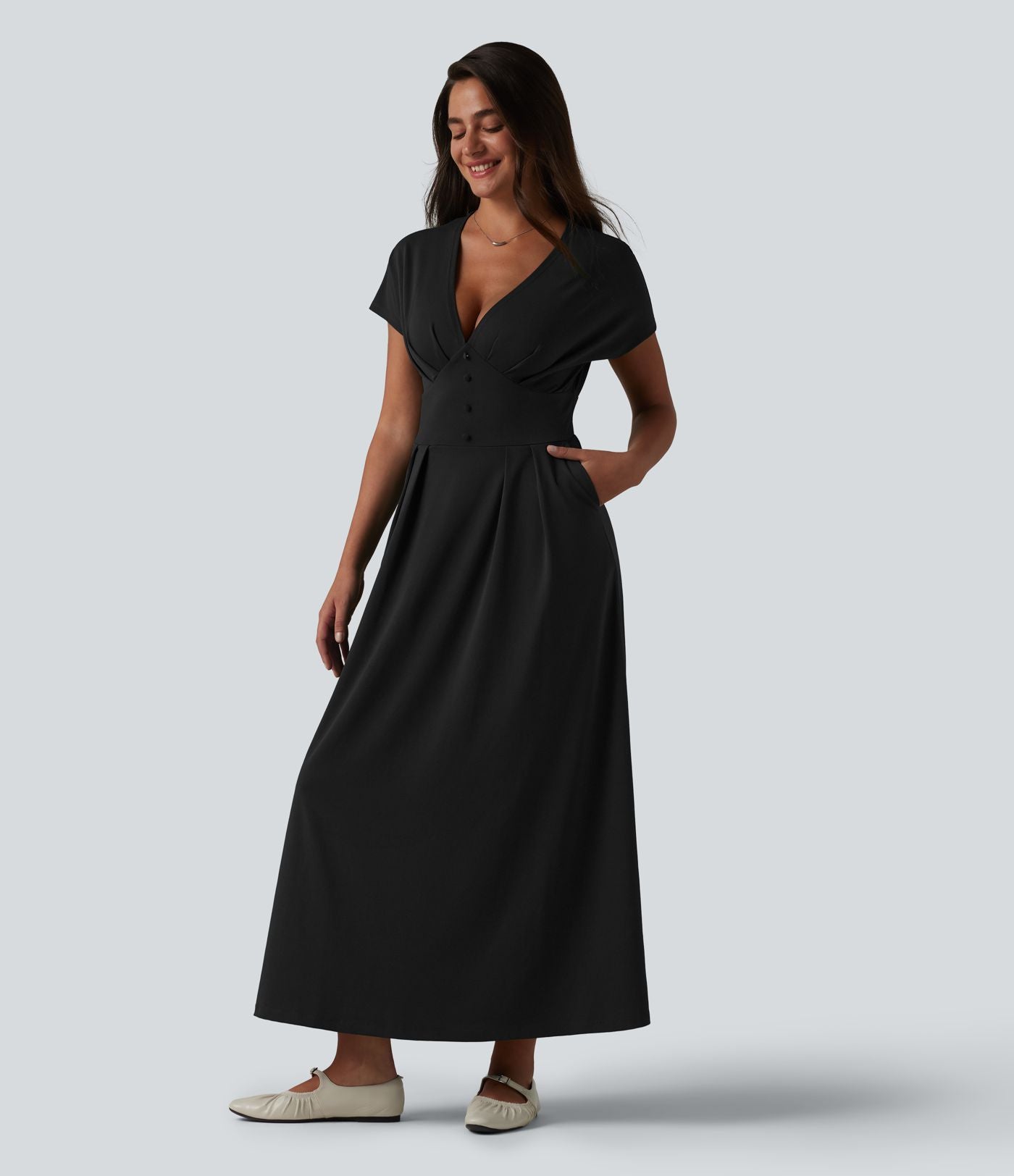 Robe midi à manches courtes chauve-souris et col en V avec poches