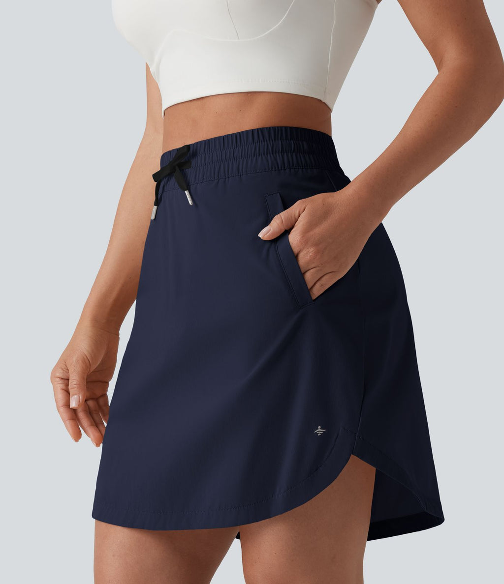 Jupe-short golf mini 2-en-1 taille haute à cordon de serrage et ourlet arrondi avec poches - Longueur plus longue
