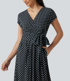 Robe midi à pois col V avec manches courtes, lien côté et poches