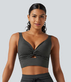 Brassière de sport push-up rayée à maintien léger, avec coussinets fixes, idéale pour le yoga.