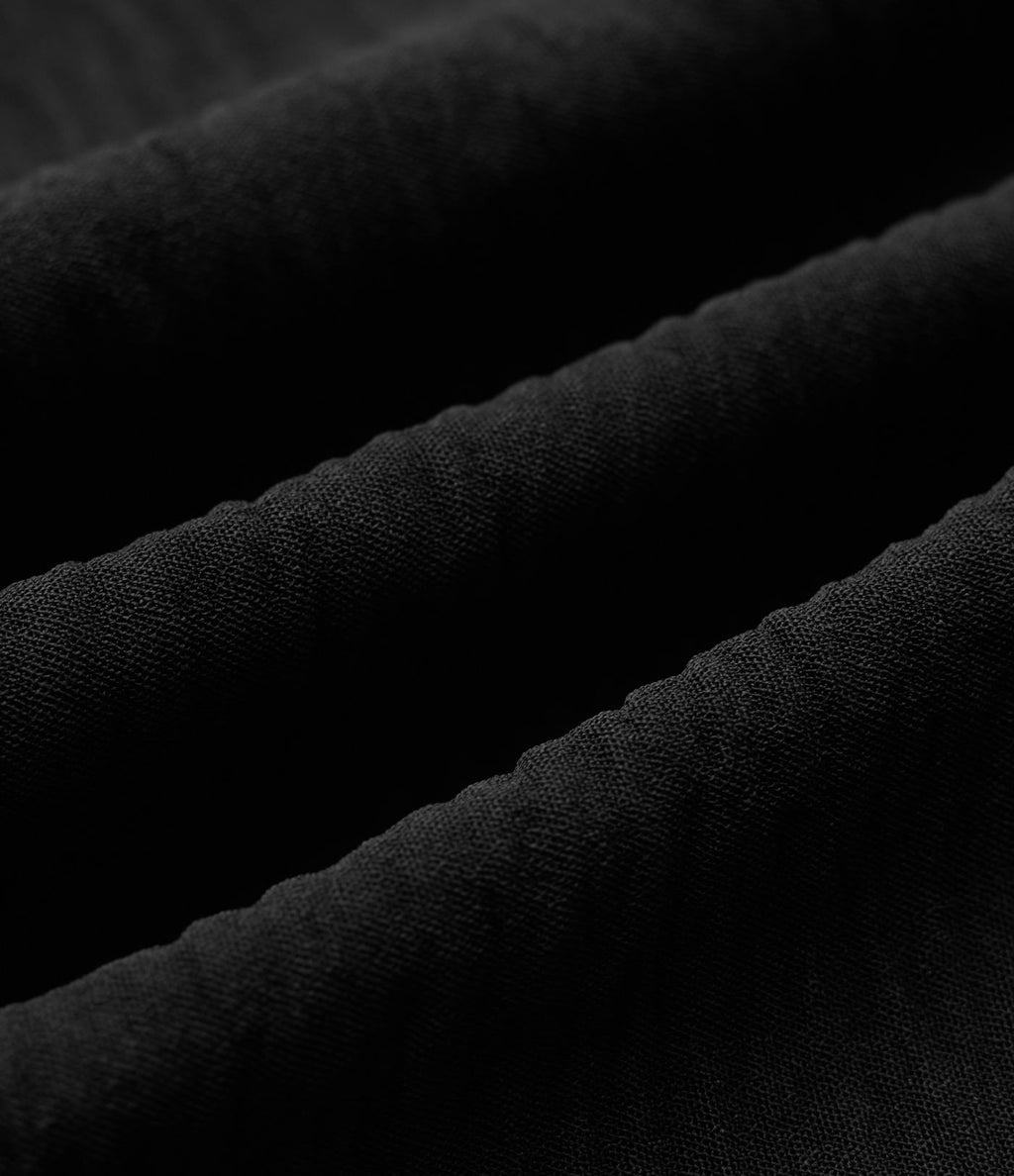 Pantalon ample décontracté à taille mi-haute, fentes, aspect lin, cordon de serrage et poches