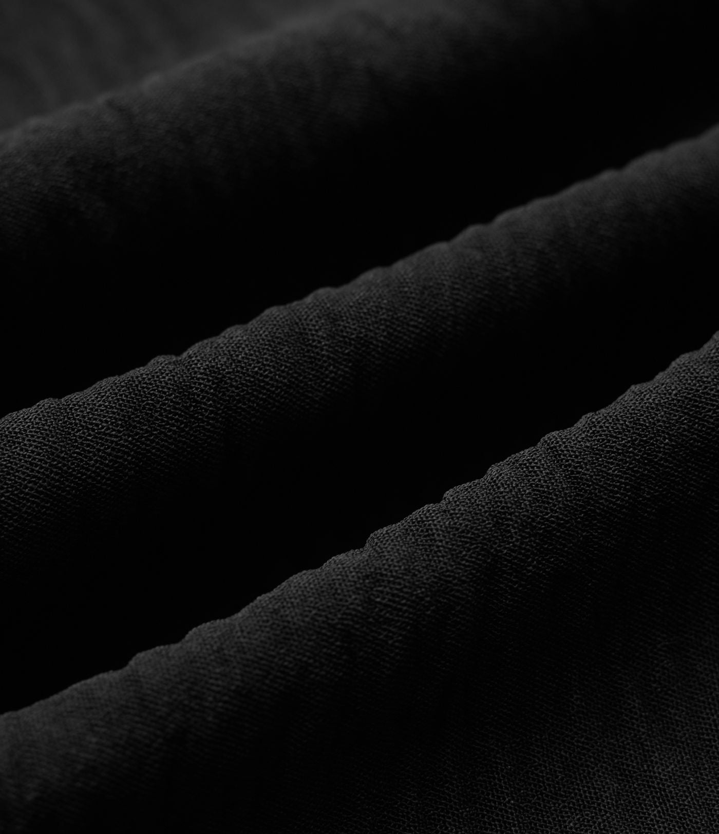 Pantalon ample décontracté à taille mi-haute, fentes, aspect lin, cordon de serrage et poches