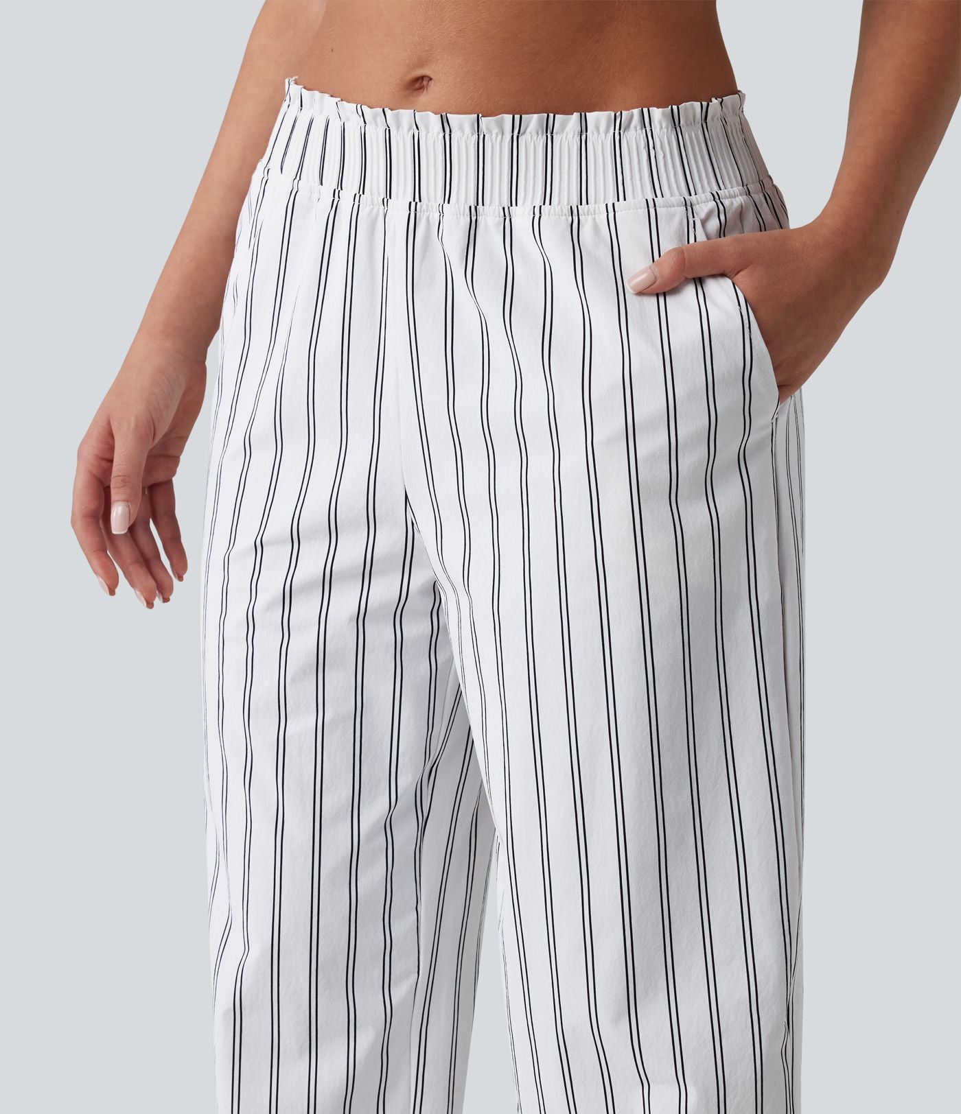 Pantalon de tennis rayé à taille mi-haute et jambes droites avec poches