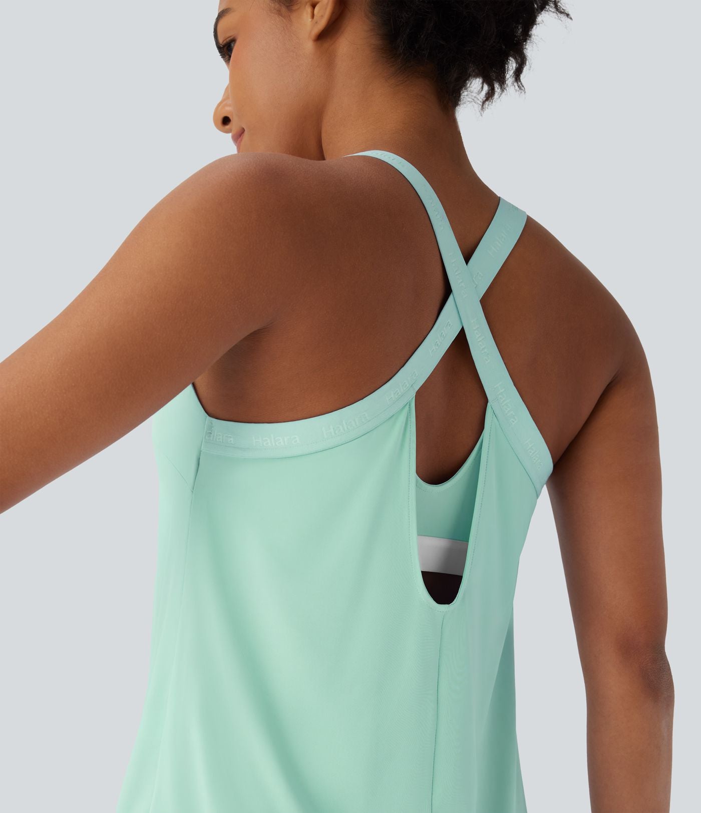Débardeur yoga dos nu col U avec bretelles croisées, ourlet arrondi et effet frais InstantCool, protection solaire UPF50+