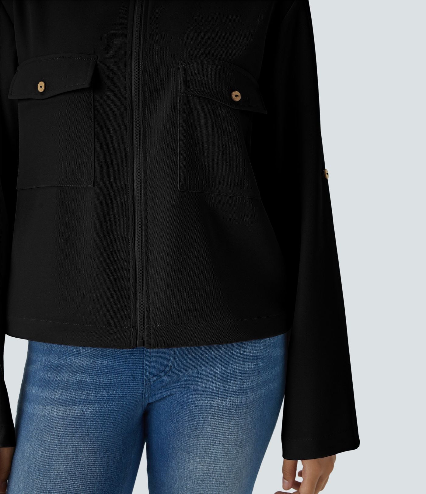 Blouson décontracté à col montant, manches retroussables, poches à rabat, cordon de serrage intérieur et fermeture éclair