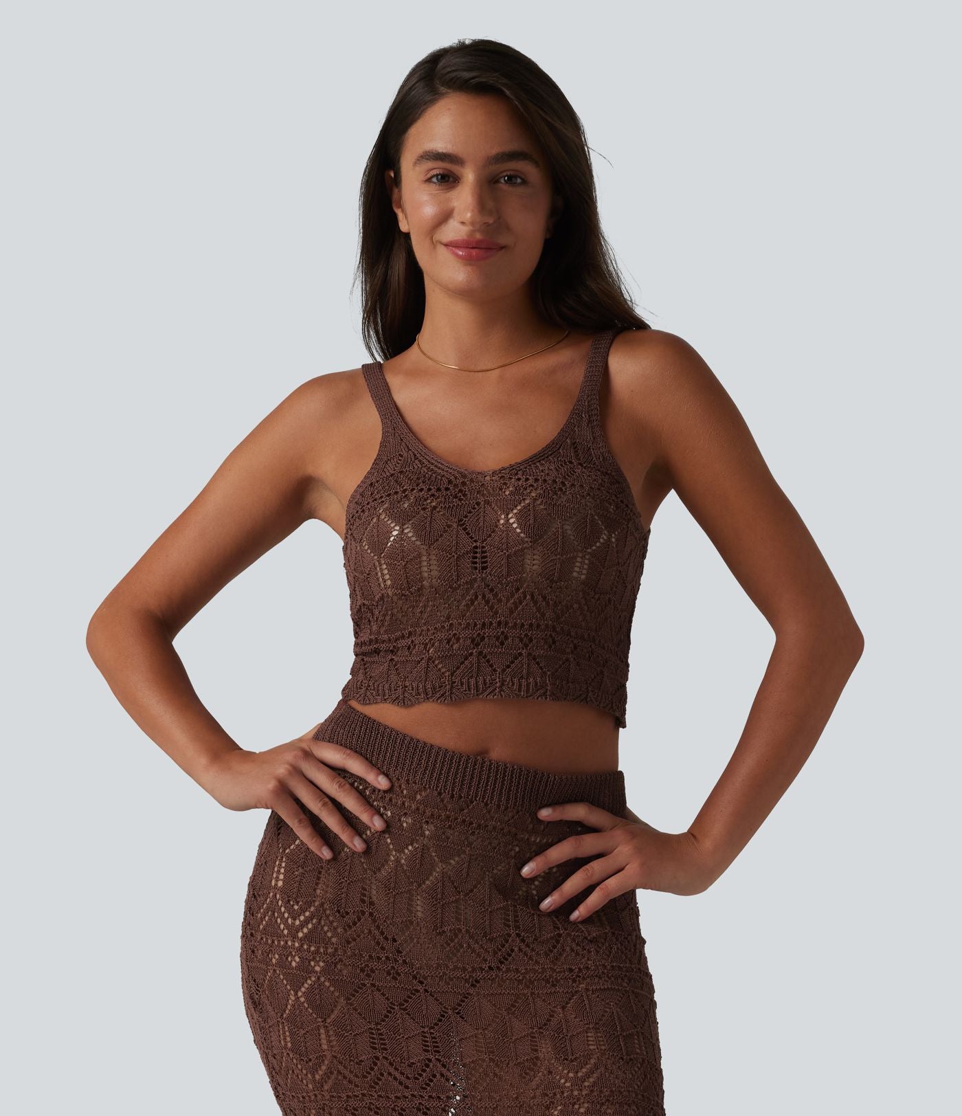 Débardeur pull crop à maille ajourée