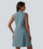 Robe de bureau mini en popeline stretch plissée col V sans manches avec fermeture éclair invisible et poches