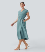 Robe midi Breezeful™ col V manches courtes à liens dans le dos séchage rapide avec poches latérales