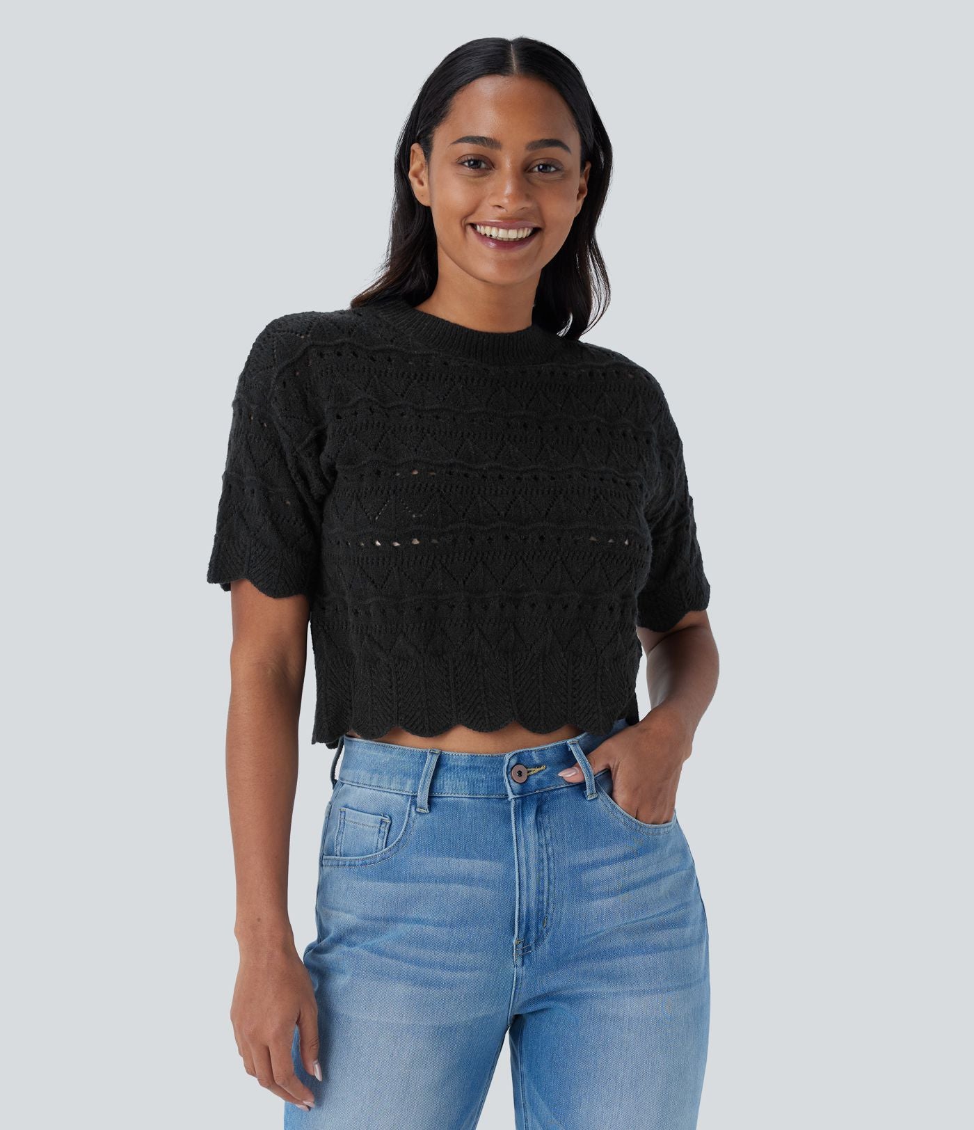 Pull décontracté en maille ajourée à col rond, manches courtes et bordure festonnée