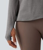 Haut de sport yoga dos nu manches longues avec trous pouces