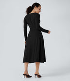 Robe fluide côtelée col V manches longues ceinturée mi-longue