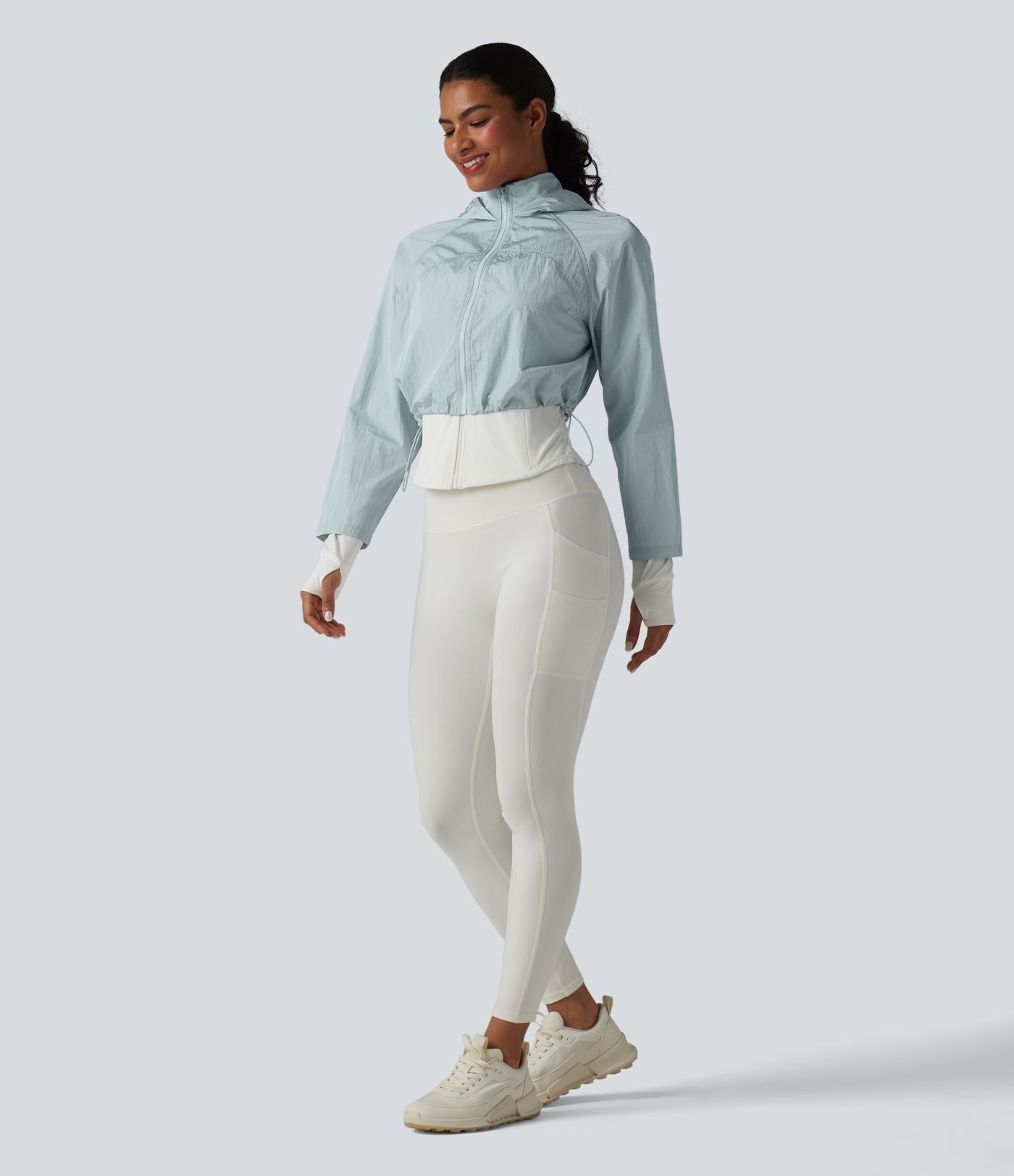Veste de running 3-en-1 déperlante à capuche avec trous pour les pouces, ourlet arrondi et poches
