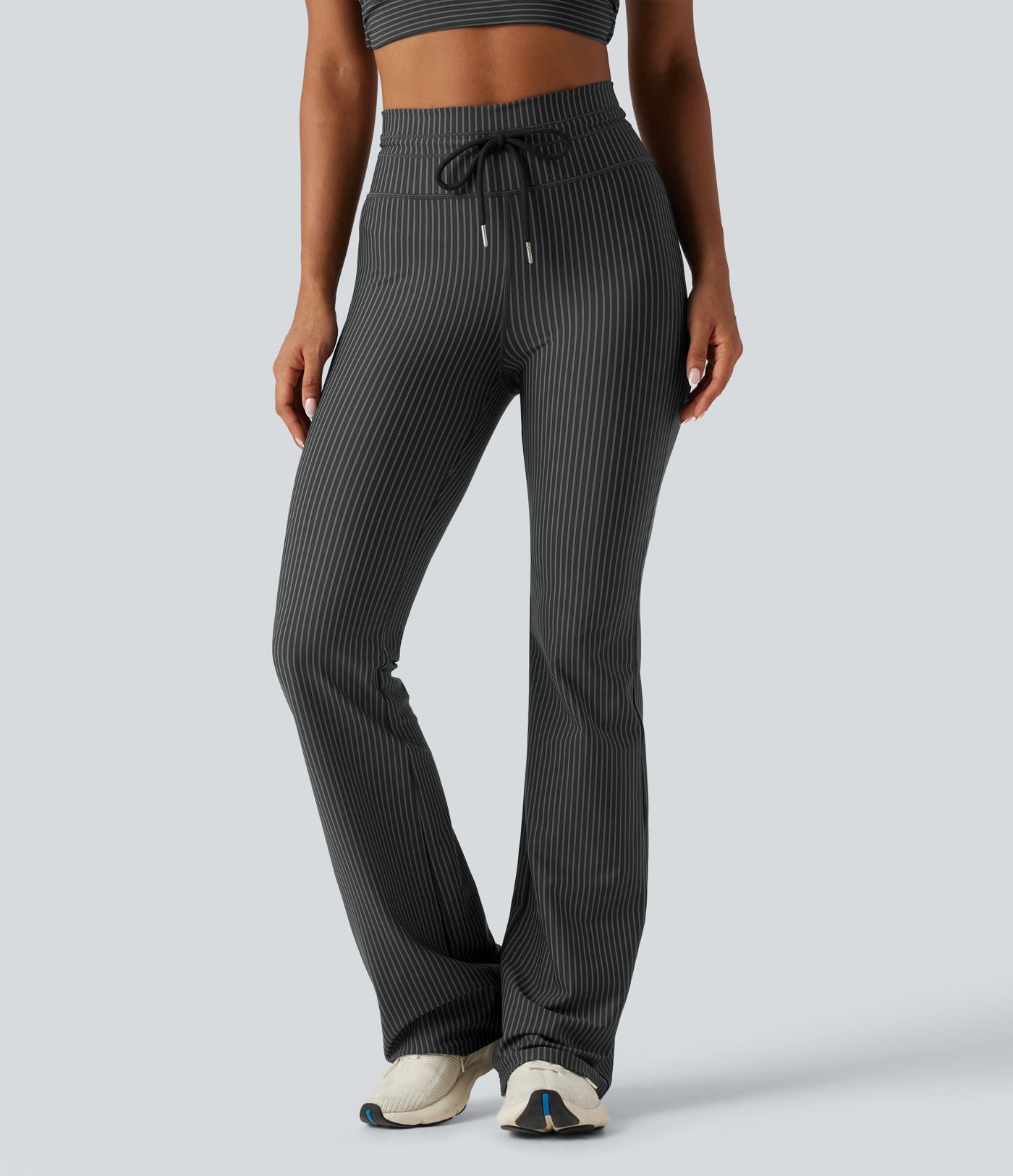 Pantalon de yoga flare taille haute rayé avec cordon de serrage et poches