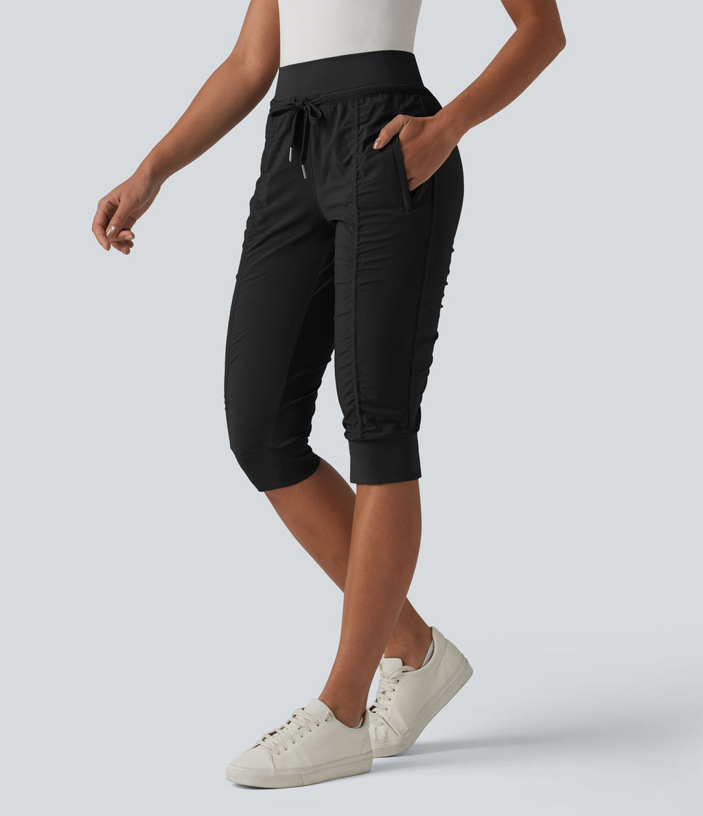 Jogging fuselé taille haute avec cordon de serrage et poches zippées