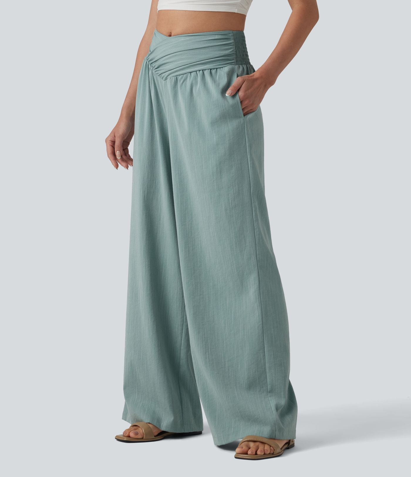 Pantalon baggy effet lin taille haute croisée avec détails froncés et poche