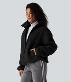 Veste sherpa col roulé manches longues avec poches