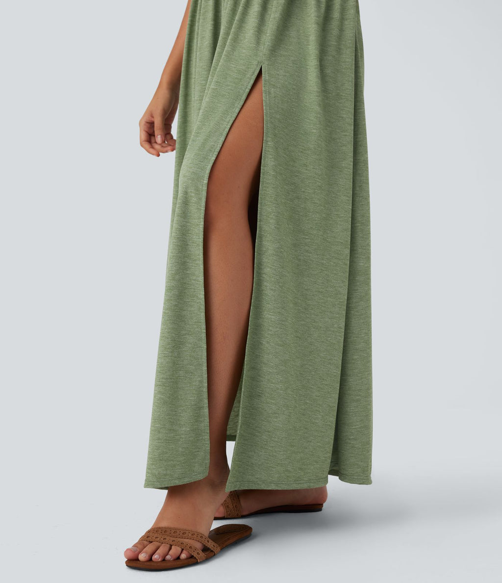 Robe longue fluide fendue avec poches latérales, dos nu et effet torsadé