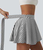 Jupe tennis mini fluide 2-en-1 taille haute imprimé léopard avec liens latéraux et poche