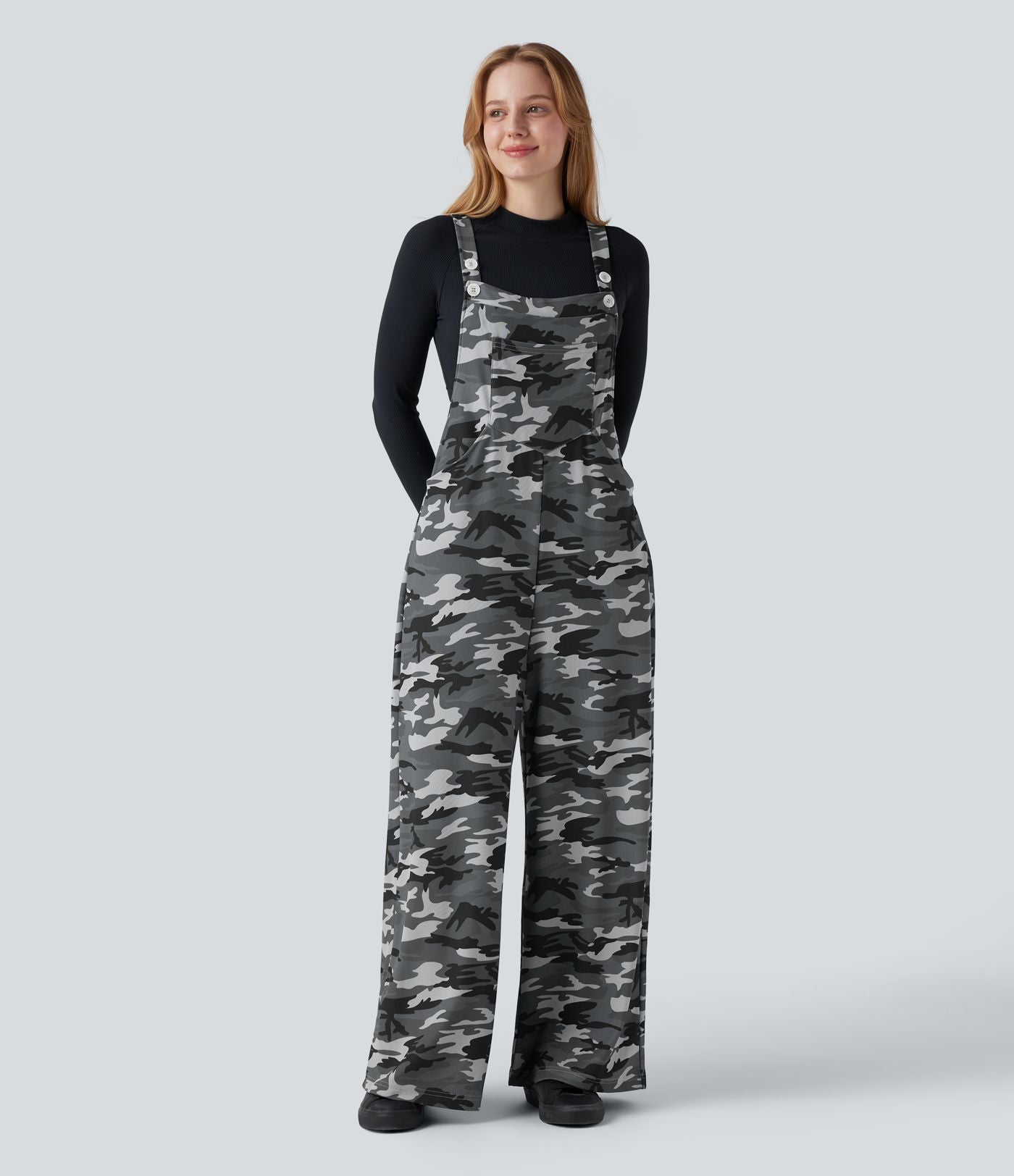 Salopette en maille gaufrée imprimé camouflage avec poches
