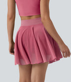Jupe mini fluide évasée 2-en-1 taille haute à cordon, empiècements en mesh contrastant, avec poche, version plus longue