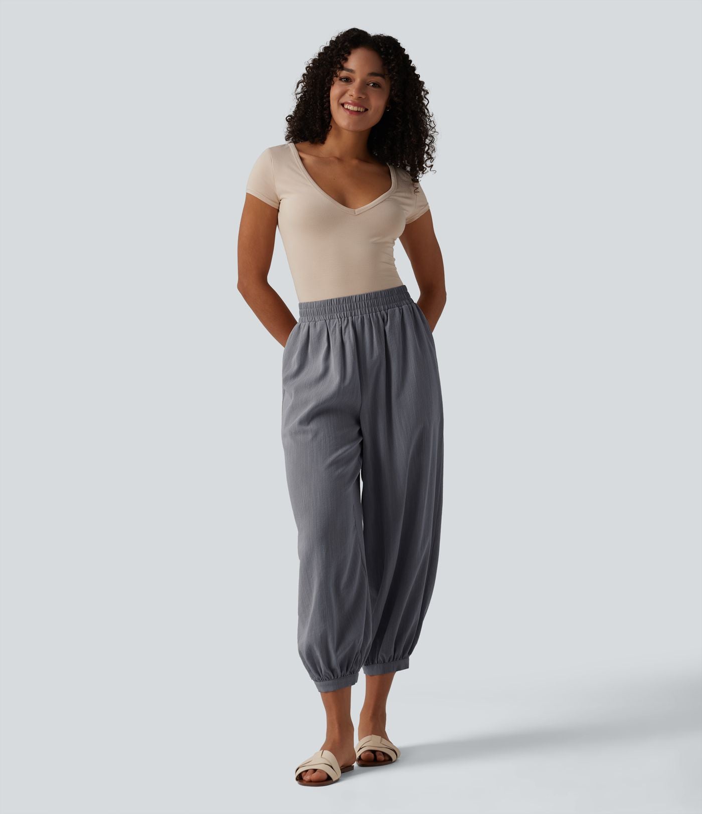 Pantalon décontracté coupe ballon taille haute aspect lin avec poches