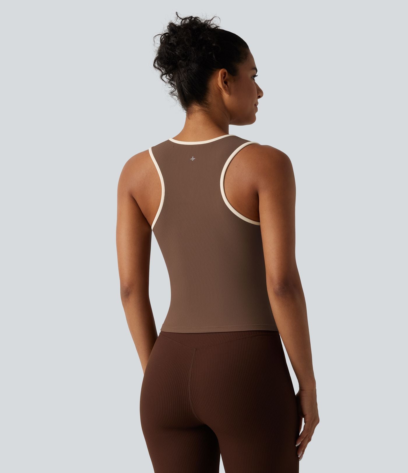 Débardeur de sport côtelé col rond color block avec découpe à l'avant