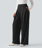 Pantalon tailleur jambes larges taille haute avec poches