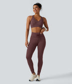 Brassière de sport col V dos nageur maintien moyen à rayures
