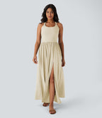 Robe longue fluide fendue avec poches latérales, dos nu et effet torsadé