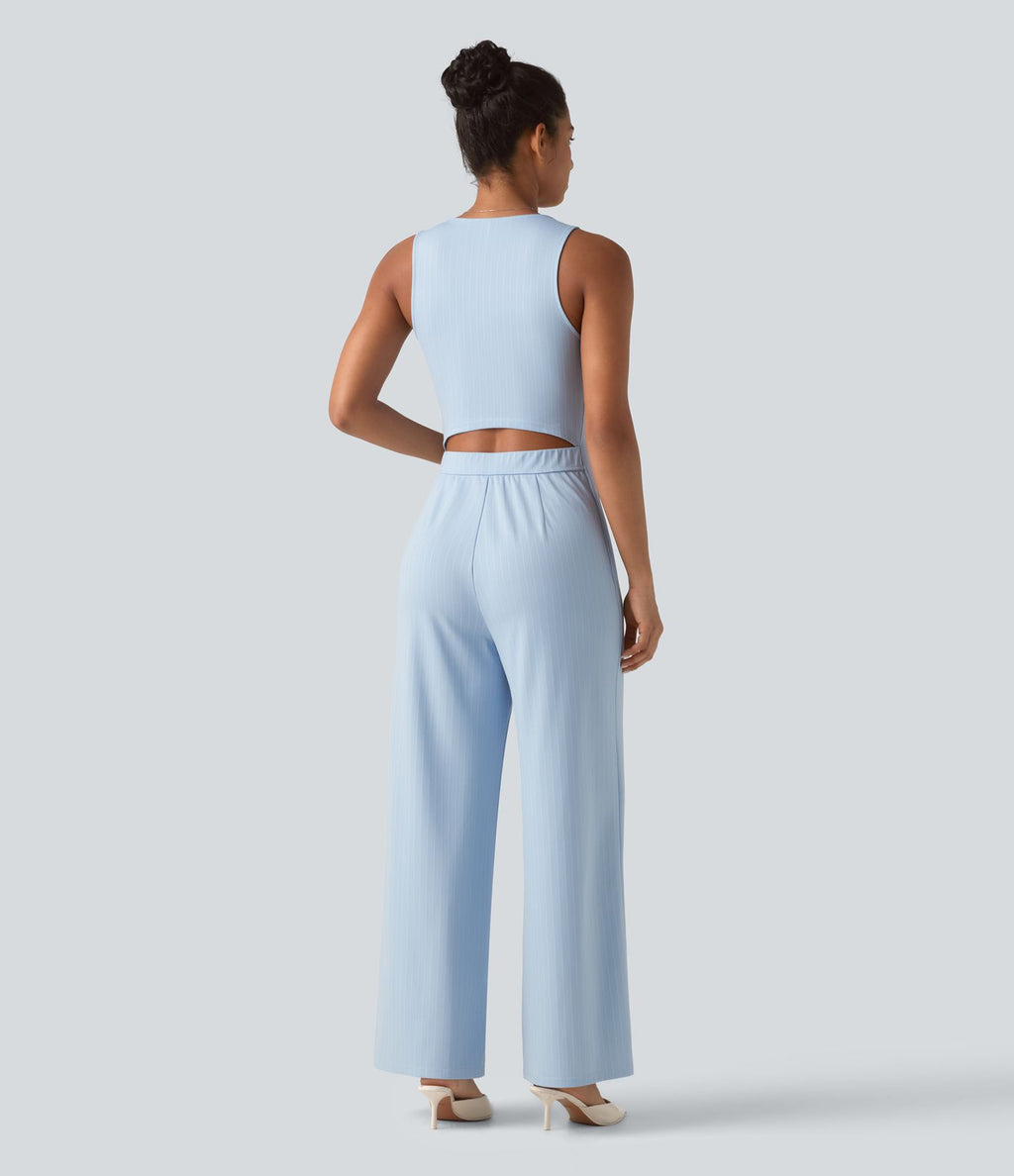 Combinaison tailleur rayée à jambes larges, décolleté en V, découpe et poches