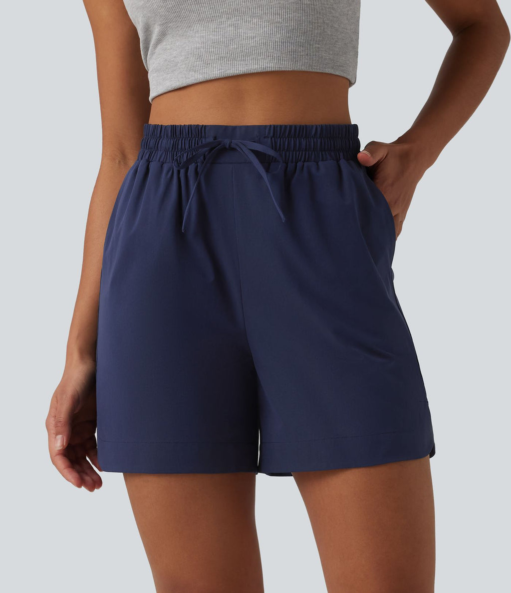 Short ample décontracté taille haute avec cordon de serrage ourlet arrondi avec poches