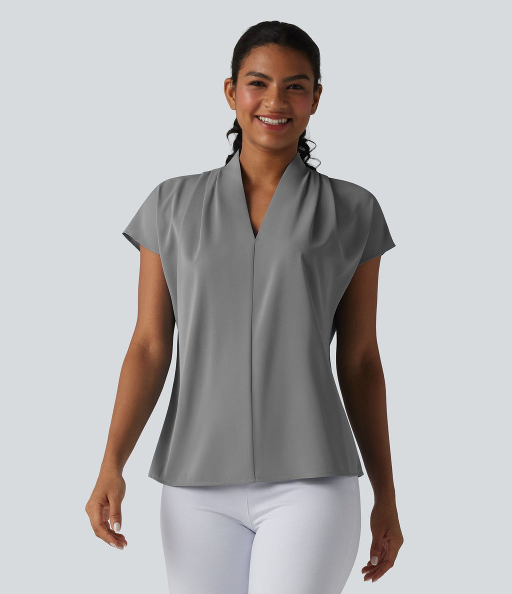 Blouse esprit bureau ample défroissage facile, col V et manches chauve-souris